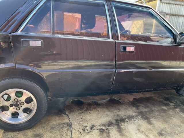 Коричневый Лянча Дельта, объемом двигателя 1.3 л и пробегом 290 тыс. км за 600 $, фото 8 на Automoto.ua