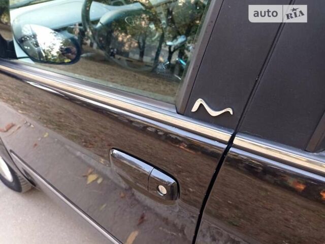 Чорний Лянча Musa, об'ємом двигуна 1.25 л та пробігом 175 тис. км за 4999 $, фото 7 на Automoto.ua