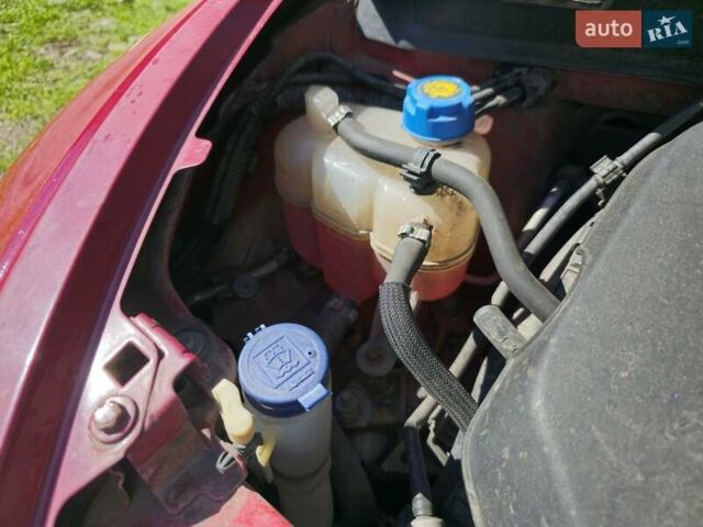 Красный Лянча Ипсилон, объемом двигателя 0.88 л и пробегом 89 тыс. км за 4444 $, фото 9 на Automoto.ua