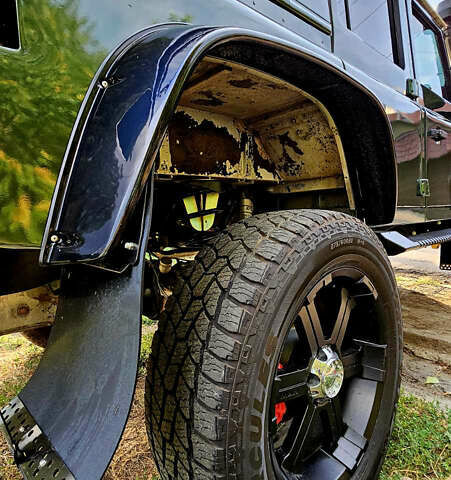 Чорний Ленд Ровер Дефендер, об'ємом двигуна 2.5 л та пробігом 231 тис. км за 56000 $, фото 14 на Automoto.ua