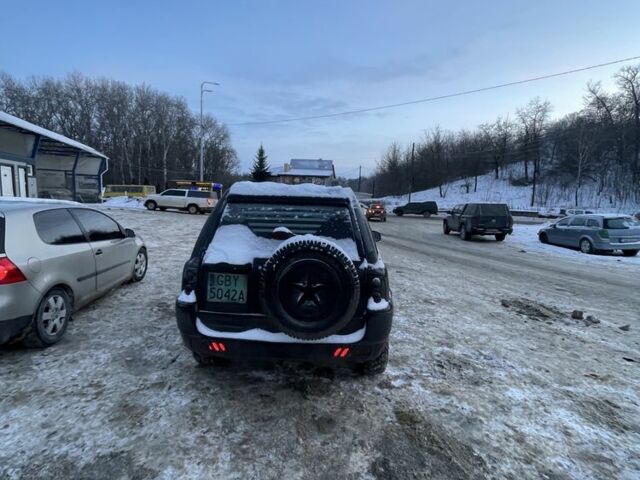 Чорний Ленд Ровер Дефендер, об'ємом двигуна 2 л та пробігом 3 тис. км за 2000 $, фото 1 на Automoto.ua
