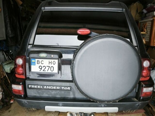 Чорний Ленд Ровер Дефендер, об'ємом двигуна 2 л та пробігом 113 тис. км за 7800 $, фото 1 на Automoto.ua