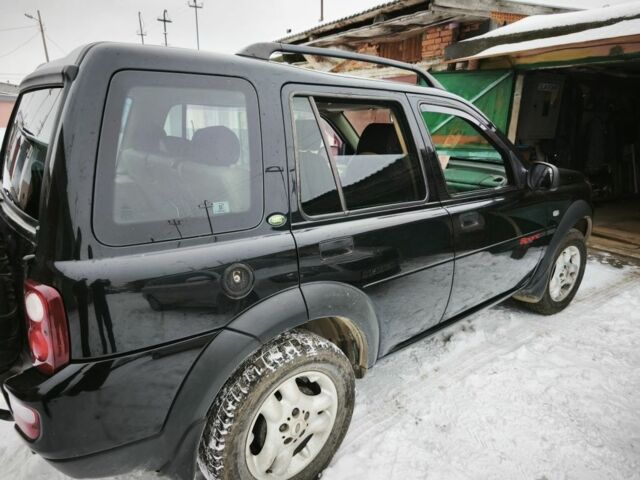 Чорний Ленд Ровер Дефендер, об'ємом двигуна 2 л та пробігом 113 тис. км за 7800 $, фото 3 на Automoto.ua