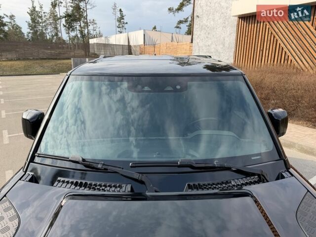 Черный Ленд Ровер Дефендер, объемом двигателя 3 л и пробегом 72 тыс. км за 75999 $, фото 24 на Automoto.ua