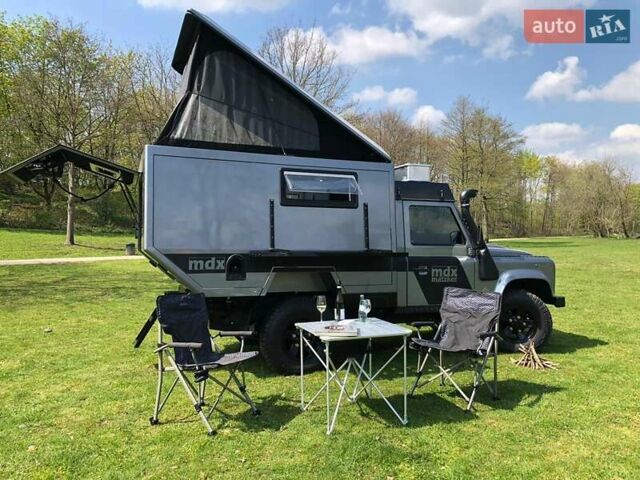 Сірий Ленд Ровер Дефендер, об'ємом двигуна 2.2 л та пробігом 80 тис. км за 99000 $, фото 3 на Automoto.ua