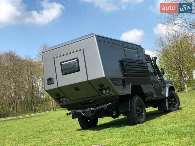 Сірий Ленд Ровер Дефендер, об'ємом двигуна 2.2 л та пробігом 80 тис. км за 99000 $, фото 1 на Automoto.ua