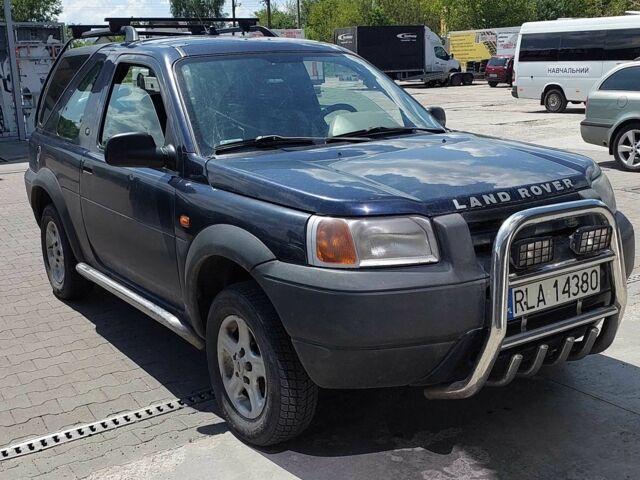 Синій Ленд Ровер Дефендер, об'ємом двигуна 2 л та пробігом 310 тис. км за 1950 $, фото 2 на Automoto.ua