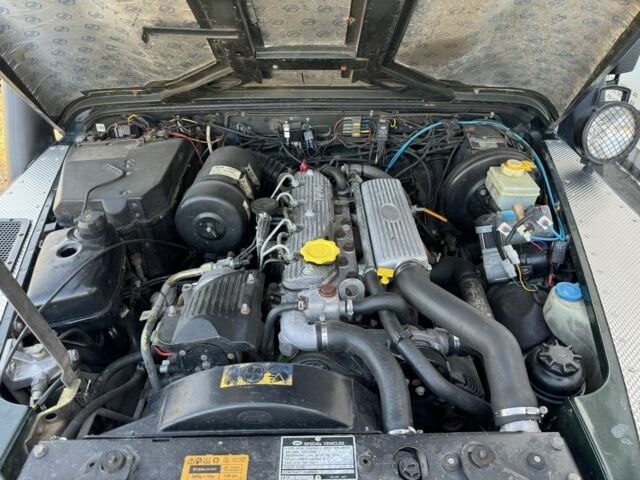 Зеленый Ленд Ровер Дефендер, объемом двигателя 2.5 л и пробегом 121 тыс. км за 18950 $, фото 23 на Automoto.ua