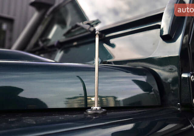 Зелений Ленд Ровер Дефендер, об'ємом двигуна 2.2 л та пробігом 98 тис. км за 87000 $, фото 5 на Automoto.ua