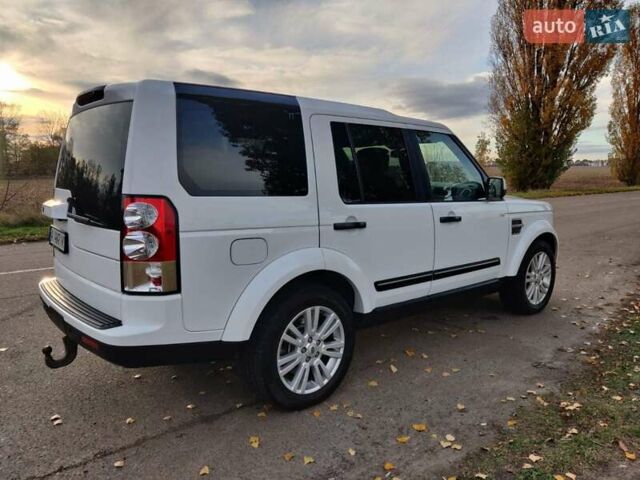 Білий Ленд Ровер Діскавері, об'ємом двигуна 3 л та пробігом 316 тис. км за 14800 $, фото 11 на Automoto.ua