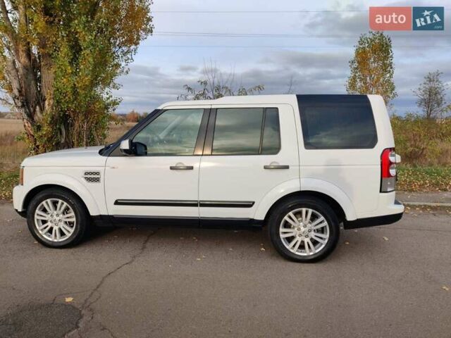 Білий Ленд Ровер Діскавері, об'ємом двигуна 3 л та пробігом 316 тис. км за 14800 $, фото 7 на Automoto.ua