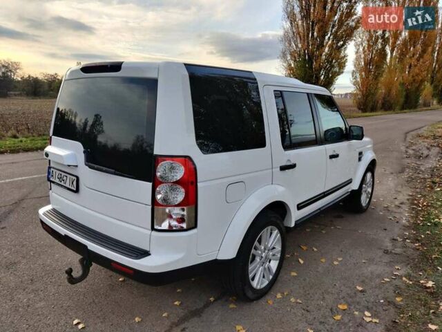 Білий Ленд Ровер Діскавері, об'ємом двигуна 3 л та пробігом 316 тис. км за 14800 $, фото 17 на Automoto.ua