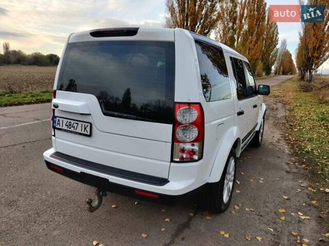 Білий Ленд Ровер Діскавері, об'ємом двигуна 3 л та пробігом 316 тис. км за 14800 $, фото 10 на Automoto.ua