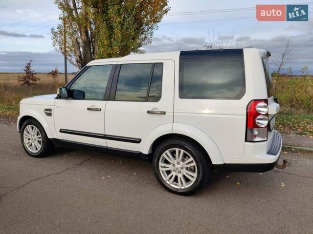 Білий Ленд Ровер Діскавері, об'ємом двигуна 3 л та пробігом 316 тис. км за 14800 $, фото 5 на Automoto.ua