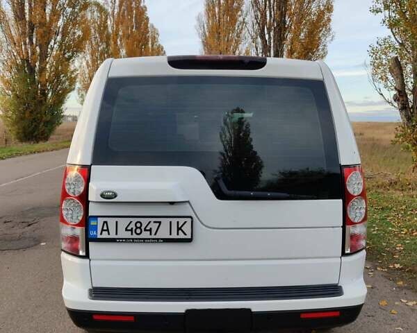 Білий Ленд Ровер Діскавері, об'ємом двигуна 3 л та пробігом 316 тис. км за 14800 $, фото 1 на Automoto.ua