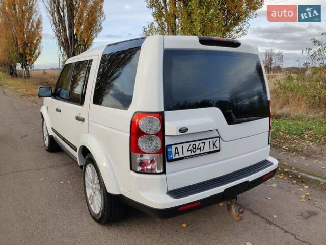 Білий Ленд Ровер Діскавері, об'ємом двигуна 3 л та пробігом 316 тис. км за 14800 $, фото 6 на Automoto.ua