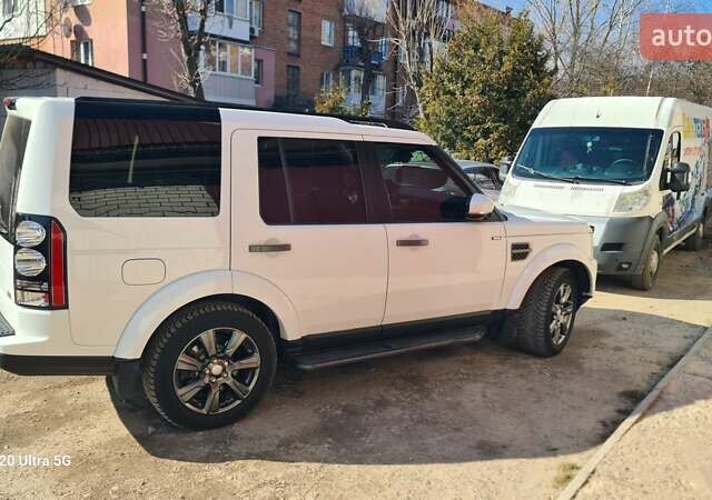 Білий Ленд Ровер Діскавері, об'ємом двигуна 3 л та пробігом 253 тис. км за 18800 $, фото 17 на Automoto.ua