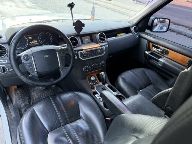 Білий Ленд Ровер Діскавері, об'ємом двигуна 5 л та пробігом 220 тис. км за 5450 $, фото 9 на Automoto.ua