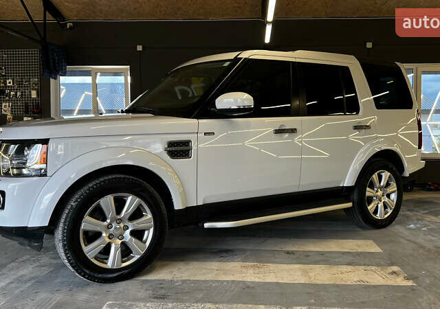 Білий Ленд Ровер Діскавері, об'ємом двигуна 3 л та пробігом 173 тис. км за 22950 $, фото 2 на Automoto.ua
