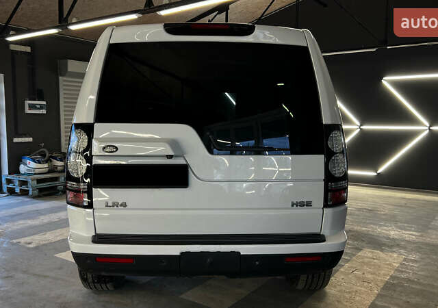 Білий Ленд Ровер Діскавері, об'ємом двигуна 3 л та пробігом 173 тис. км за 22950 $, фото 4 на Automoto.ua