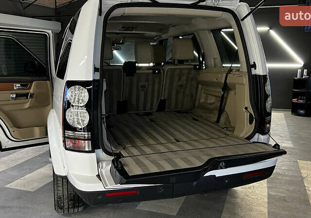 Білий Ленд Ровер Діскавері, об'ємом двигуна 3 л та пробігом 173 тис. км за 22950 $, фото 14 на Automoto.ua