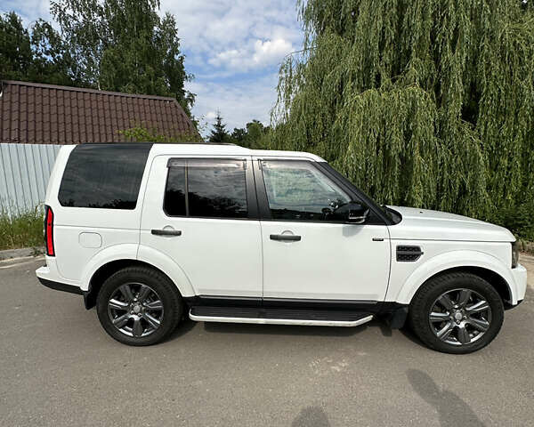 Білий Ленд Ровер Діскавері, об'ємом двигуна 3 л та пробігом 176 тис. км за 24900 $, фото 6 на Automoto.ua