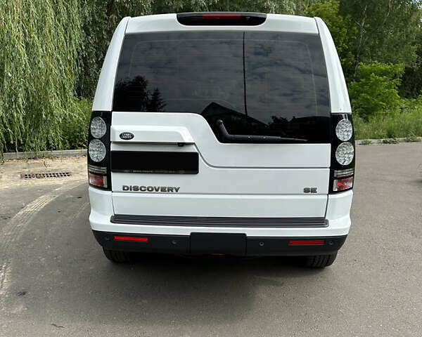 Білий Ленд Ровер Діскавері, об'ємом двигуна 3 л та пробігом 176 тис. км за 24900 $, фото 5 на Automoto.ua