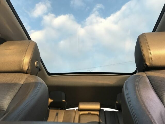 Білий Ленд Ровер Діскавері, об'ємом двигуна 2 л та пробігом 170 тис. км за 16000 $, фото 7 на Automoto.ua