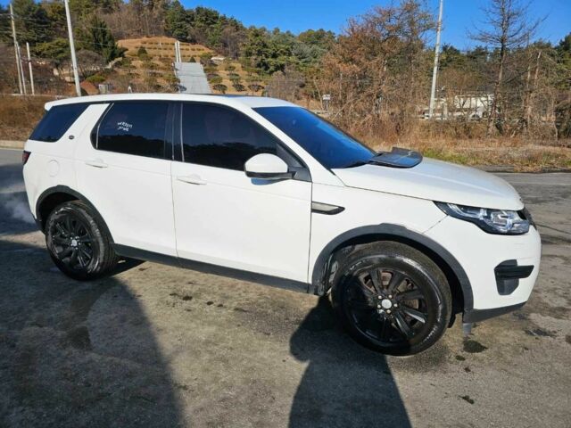 Білий Ленд Ровер Діскавері, об'ємом двигуна 2 л та пробігом 193 тис. км за 5600 $, фото 1 на Automoto.ua