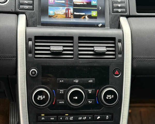 Білий Ленд Ровер Діскавері, об'ємом двигуна 2 л та пробігом 104 тис. км за 19999 $, фото 13 на Automoto.ua