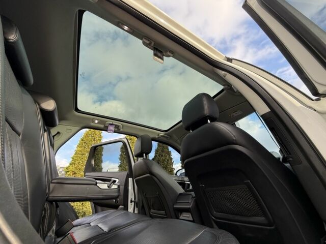 Білий Ленд Ровер Діскавері, об'ємом двигуна 2 л та пробігом 158 тис. км за 17200 $, фото 17 на Automoto.ua