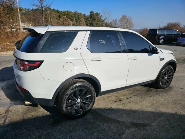 Білий Ленд Ровер Діскавері, об'ємом двигуна 2 л та пробігом 193 тис. км за 5600 $, фото 2 на Automoto.ua