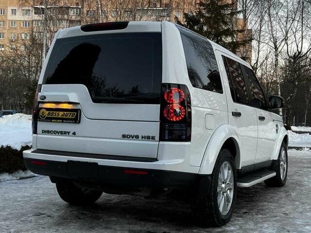 Білий Ленд Ровер Діскавері, об'ємом двигуна 3 л та пробігом 170 тис. км за 21900 $, фото 6 на Automoto.ua