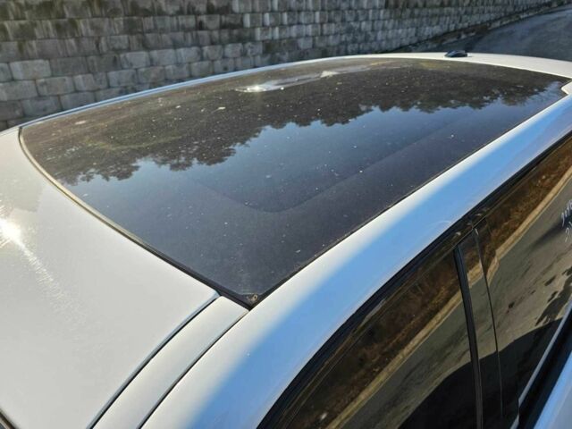 Білий Ленд Ровер Діскавері, об'ємом двигуна 2 л та пробігом 193 тис. км за 5600 $, фото 6 на Automoto.ua