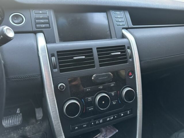 Білий Ленд Ровер Діскавері, об'ємом двигуна 2 л та пробігом 167 тис. км за 13800 $, фото 5 на Automoto.ua