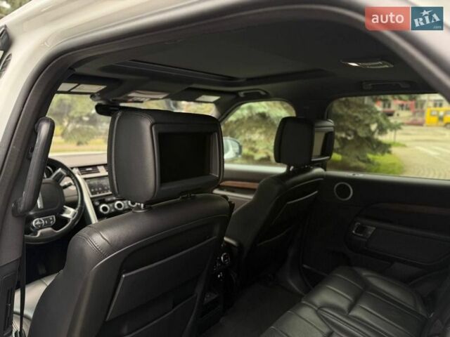 Білий Ленд Ровер Діскавері, об'ємом двигуна 3 л та пробігом 207 тис. км за 26400 $, фото 28 на Automoto.ua