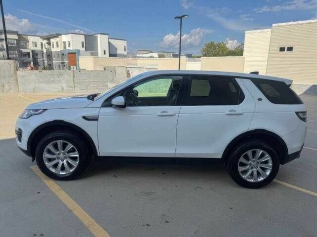 Білий Ленд Ровер Діскавері, об'ємом двигуна 2 л та пробігом 76 тис. км за 9900 $, фото 6 на Automoto.ua