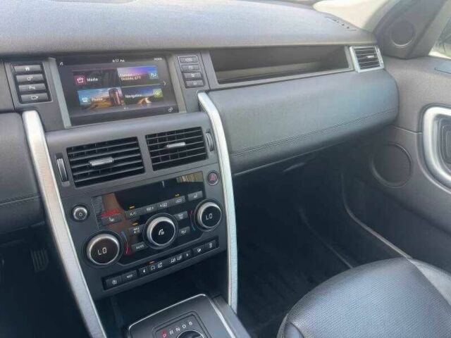 Білий Ленд Ровер Діскавері, об'ємом двигуна 2 л та пробігом 76 тис. км за 9900 $, фото 12 на Automoto.ua