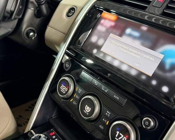 Білий Ленд Ровер Діскавері, об'ємом двигуна 3 л та пробігом 127 тис. км за 32000 $, фото 10 на Automoto.ua