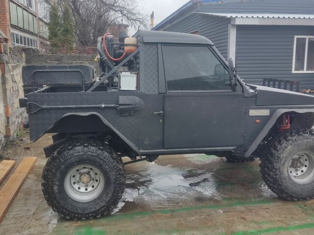 Чорний Ленд Ровер Діскавері, об'ємом двигуна 2 л та пробігом 100 тис. км за 8900 $, фото 4 на Automoto.ua
