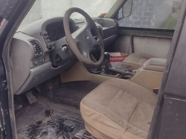 Чорний Ленд Ровер Діскавері, об'ємом двигуна 2 л та пробігом 100 тис. км за 8900 $, фото 9 на Automoto.ua