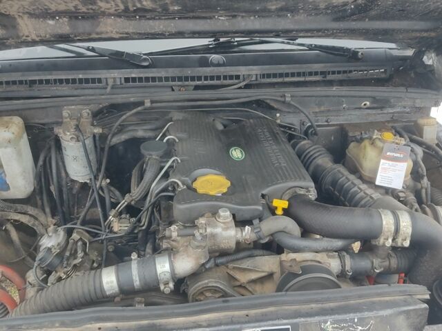 Чорний Ленд Ровер Діскавері, об'ємом двигуна 2 л та пробігом 100 тис. км за 8900 $, фото 5 на Automoto.ua