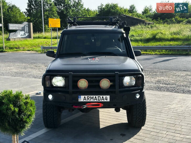 Чорний Ленд Ровер Діскавері, об'ємом двигуна 4 л та пробігом 160 тис. км за 19100 $, фото 1 на Automoto.ua