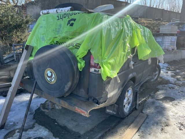 Чорний Ленд Ровер Діскавері, об'ємом двигуна 2.5 л та пробігом 250 тис. км за 2000 $, фото 1 на Automoto.ua