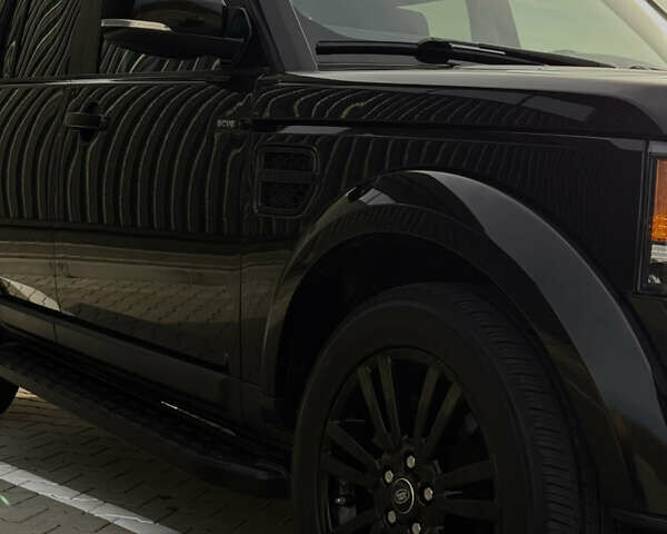 Чорний Ленд Ровер Діскавері, об'ємом двигуна 3 л та пробігом 129 тис. км за 21300 $, фото 4 на Automoto.ua