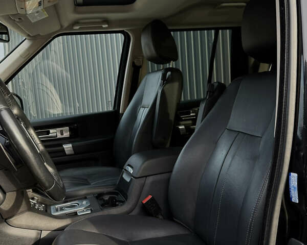 Чорний Ленд Ровер Діскавері, об'ємом двигуна 3 л та пробігом 129 тис. км за 23800 $, фото 59 на Automoto.ua