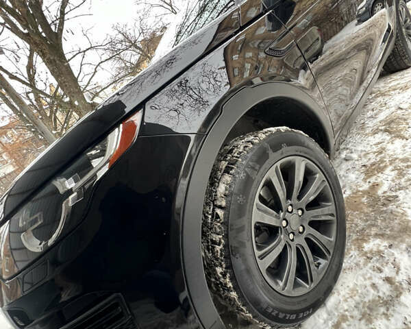 Чорний Ленд Ровер Діскавері, об'ємом двигуна 2 л та пробігом 100 тис. км за 19800 $, фото 11 на Automoto.ua