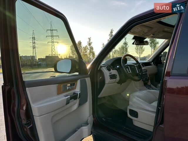 Красный Ленд Ровер Дискавери, объемом двигателя 3 л и пробегом 121 тыс. км за 22950 $, фото 23 на Automoto.ua