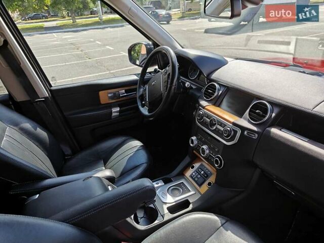 Красный Ленд Ровер Дискавери, объемом двигателя 3 л и пробегом 200 тыс. км за 16700 $, фото 9 на Automoto.ua