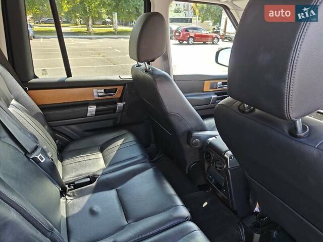 Красный Ленд Ровер Дискавери, объемом двигателя 3 л и пробегом 200 тыс. км за 16700 $, фото 11 на Automoto.ua